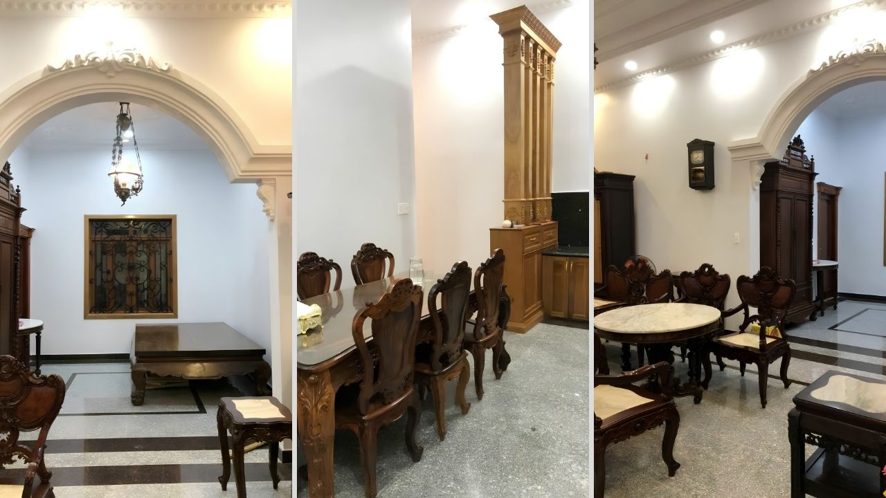 Nội thất biệt thự tân cổ điển với cửa vòm và bộ bàn ghế gỗ