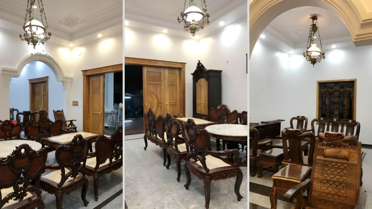 Phòng khách biệt thự 1 tầng với bộ bàn ghế gỗ phong cách tân cổ điển