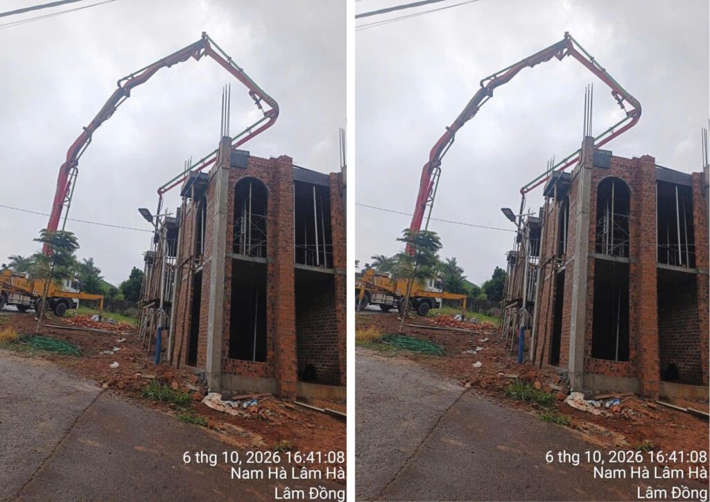 Xe bơm bê tông hoạt động tại khu vực công trình đang thi công phần thô.