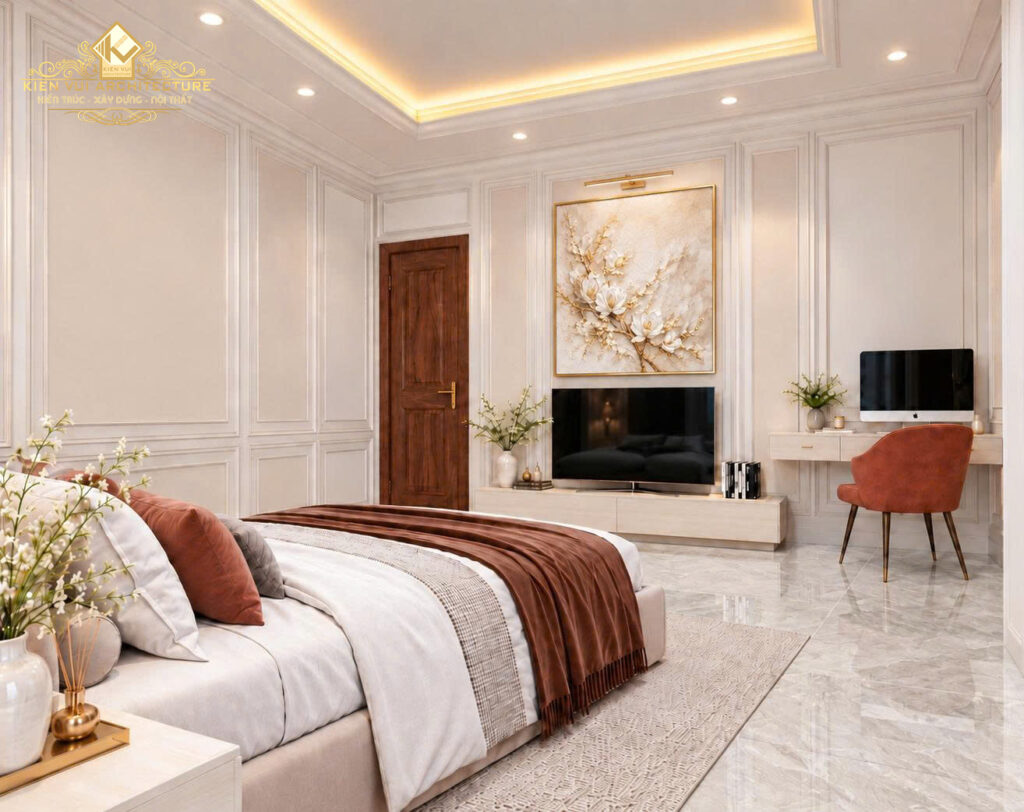 Góc nghiêng phòng ngủ với chăn nâu, TV và bàn làm việc cạnh cửa gỗ