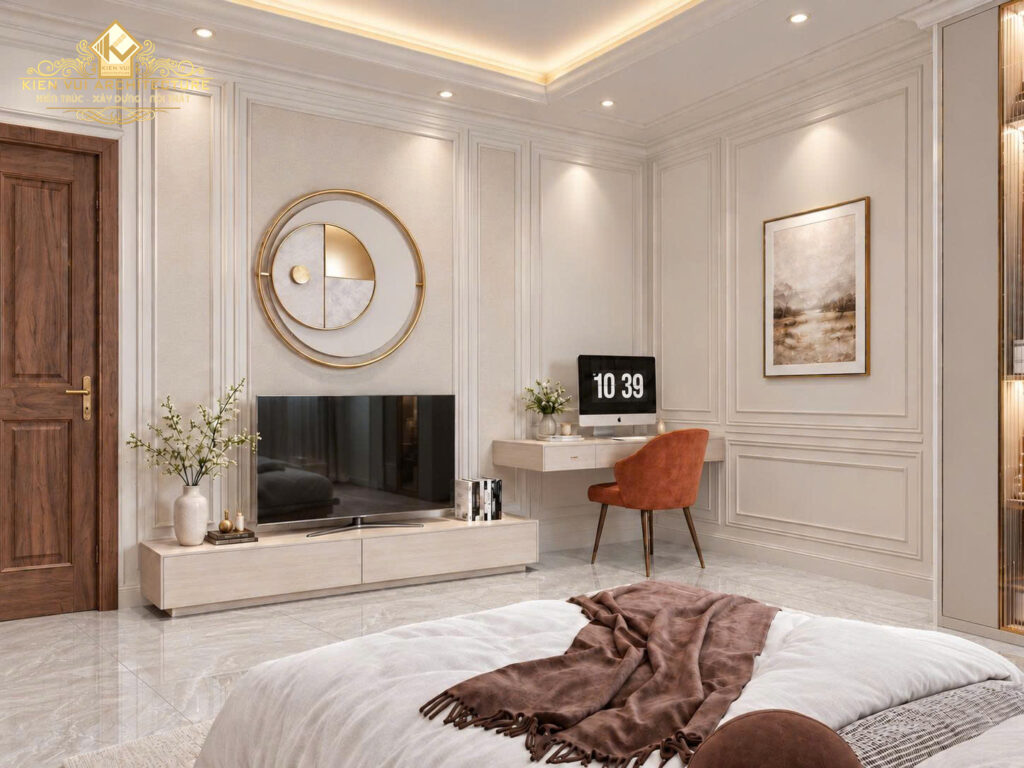Phòng ngủ màu nâu ấm nhìn về TV, bàn làm việc